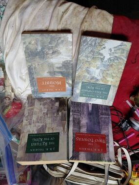 collection of vintage paperbacks of J.R.R. Tolkien's fantasy novels, LOTR/hobbit